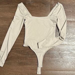 Nude long sleeve bodysuit Small Size